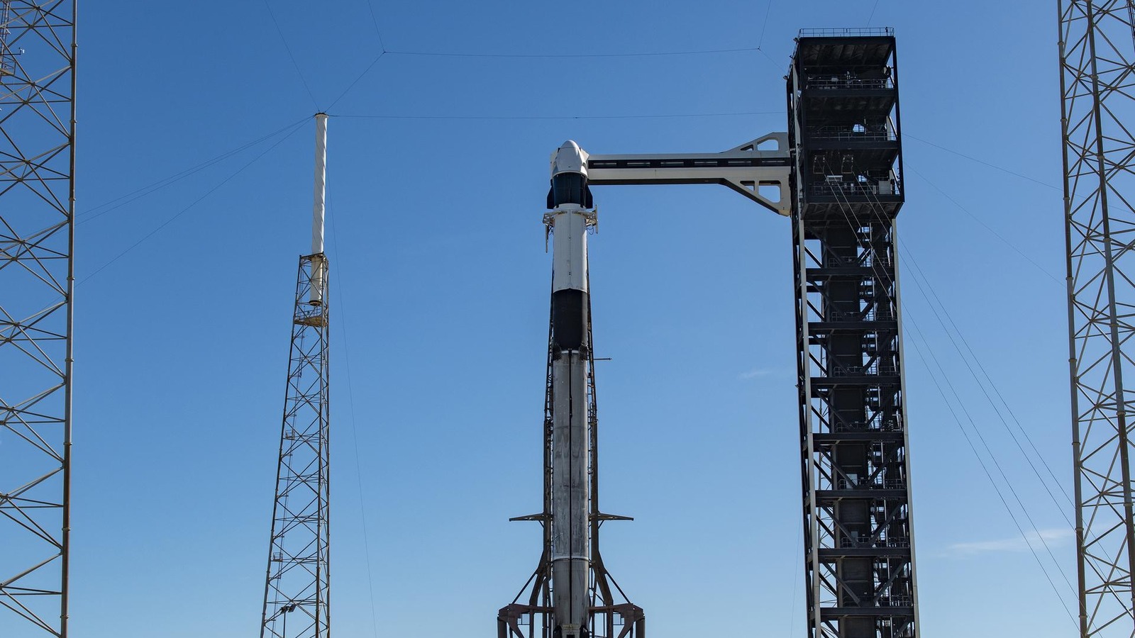 SpaceX Falcon 9 and Dragon Grace vertical at Space Launch Complex 40 ahead of Crew-13