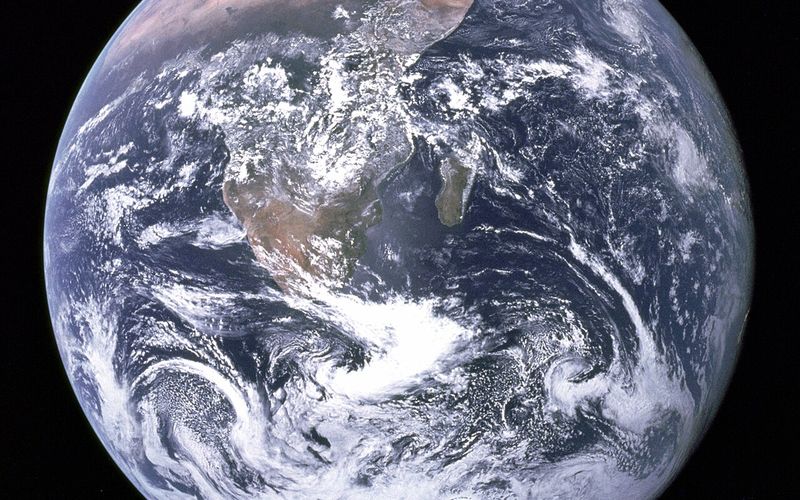Earth as a blue marble seen from deep space