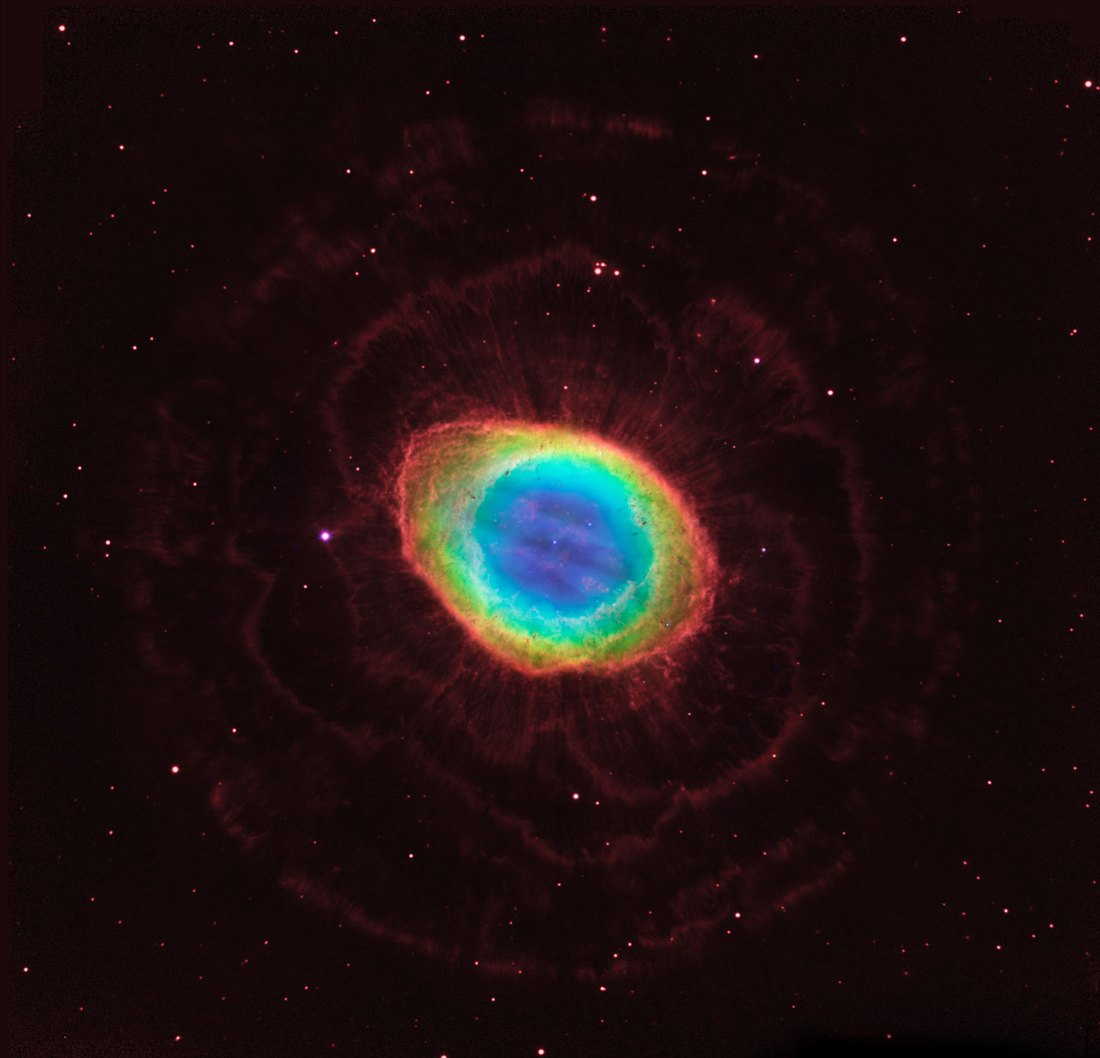 The Ring Nebula seen by Hubble and the Large Binocular Telescope, a glowing ring of gas around a central dying star