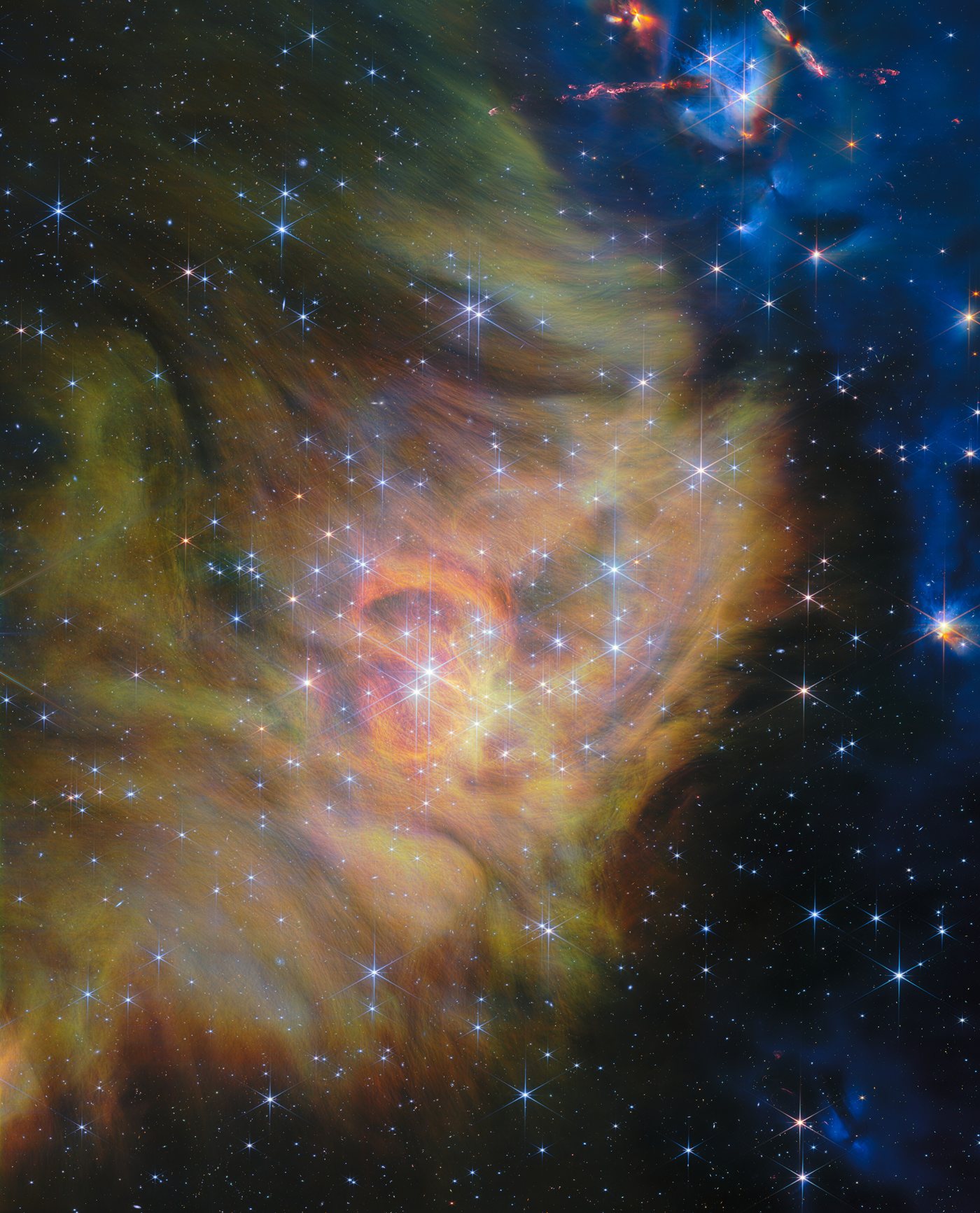 Full Webb NIRCam panorama of star-forming region IC 348, with a dense star cluster in swirling dust and jets at upper right