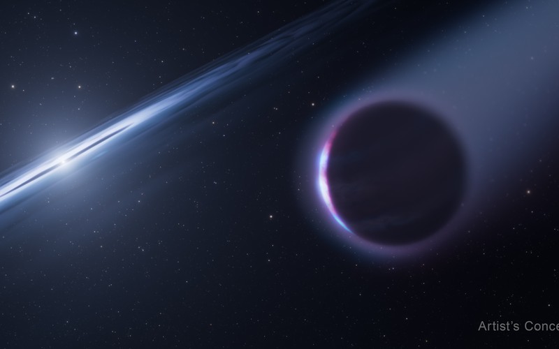 Artist’s concept of a second-generation gas giant orbiting a hot white dwarf, with atmosphere streaming toward the star