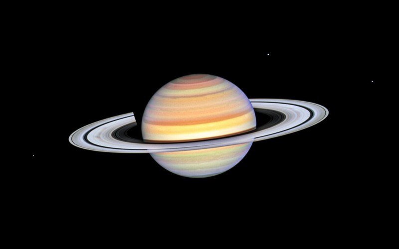 Hubble view of Saturn with banded atmosphere and tilted rings — ESA/Hubble heic2312a