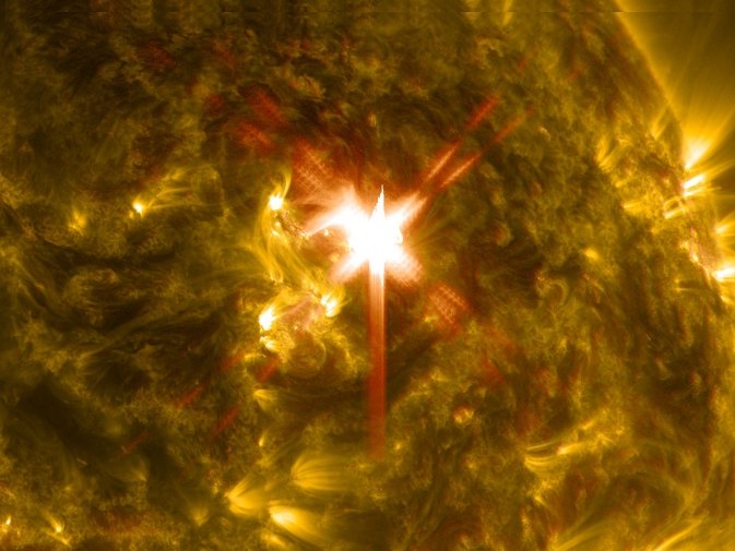 Extreme ultraviolet view of the Sun with a bright X-class solar flare streaming out from the lower atmosphere